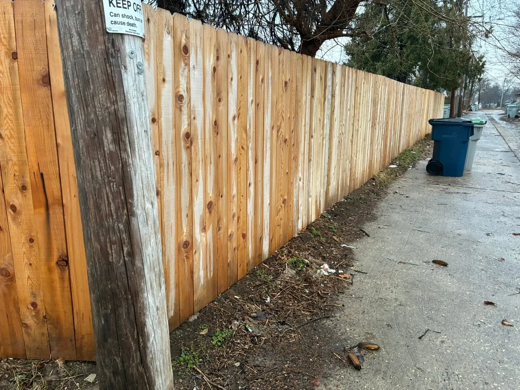 Wood fence along an alley